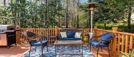 Experience the joys of outdoor living in our peaceful and inviting deck area.