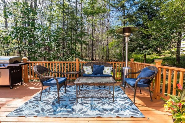 Experience the joys of outdoor living in our peaceful and inviting deck area.