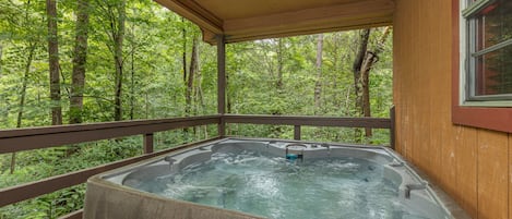 Hot tub jacuzzi is located on the private back deck