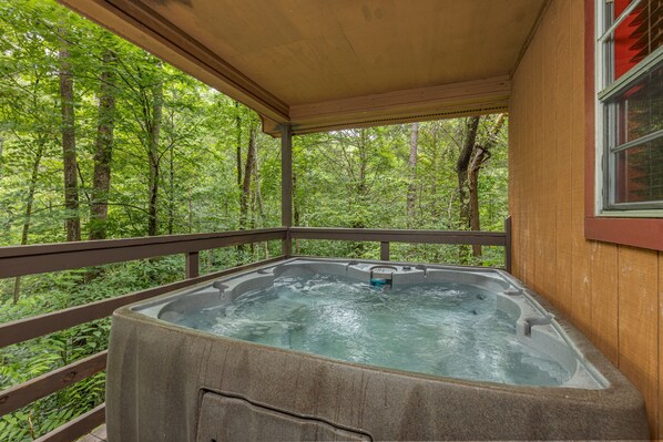 Hot tub jacuzzi is located on the private back deck