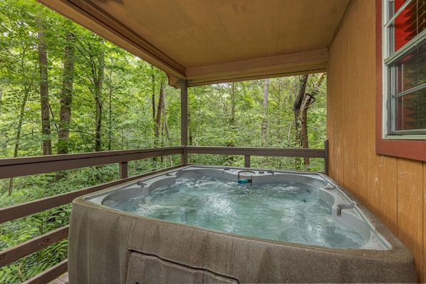 Hot tub jacuzzi is located on the private back deck