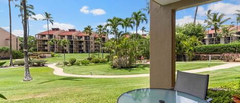 Ground floor unit with lanai that opens up green and lush resort grounds 