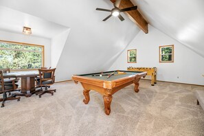 Game Room Pool table, Poker table, Foosball - Third story loft Game Room with Pool Table, Foosball, Poker/Game Table, Bar, 65-inch 4k Smart TV, Fireplace and access to an elevated deck with picturesque views of the lake and slopes.