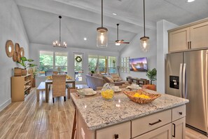 Open concept living area with lots of natural light