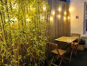 Pretty Fairy Lights at Night by the Bistro Set!