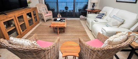 Living room looks onto the ocean