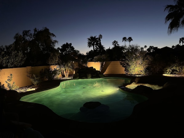 Relax in the spa and pool under the stars