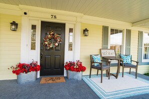 Our front porch is welcoming and decorated for the season! Come be our guest! 