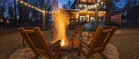 Outdoor firepit with Adirondack chairs