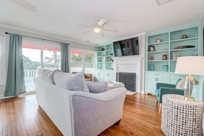 Living Room with Lots of Natural Light & Porch Access