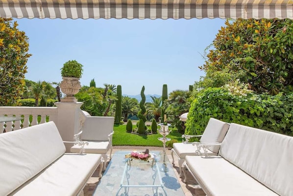 The terrace overlooking the garden and sea-view