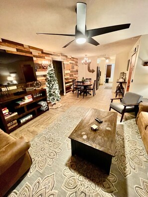 Another view of one of the family rooms looking into the kitchen of unit 4