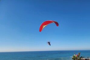 Powered Paraglider Glides by the home.