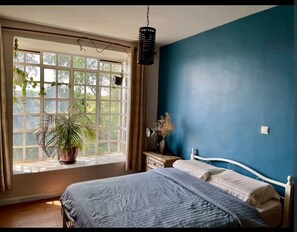 master bedroom en-suite with large bay windows 