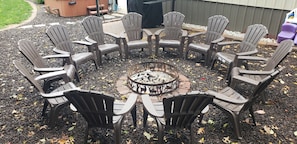 Chat w/ family & friends around a campfire. Wood & roasting sticks provided