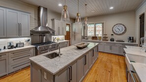 Gourmet kitchen with commercial grade oven/stove