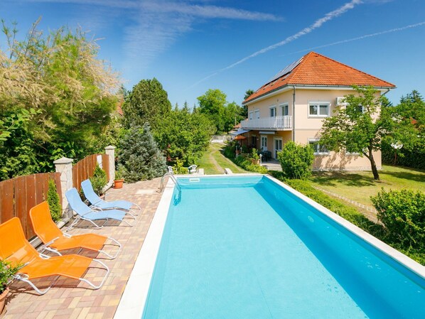 Sky, Plant, Cloud, Water, Property, Swimming Pool, Building, Nature, Azure, Tree