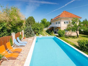 Sky, Plant, Cloud, Water, Property, Swimming Pool, Building, Nature, Azure, Tree