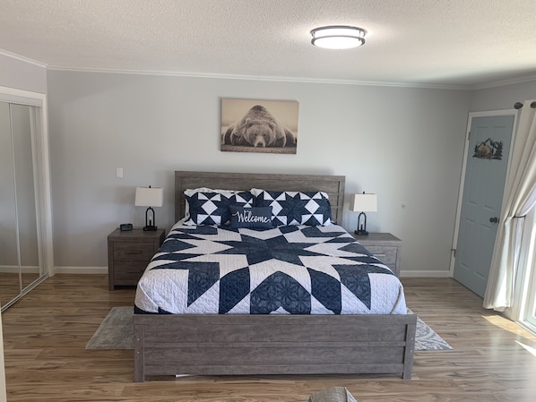 King bed with 2 nightstands. 

