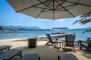 Relax in the shade on the beach under a 13` Market Umbrella.