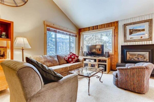 Welcome to Timbernest! Relax in the family room with comfortable furniture, gas fireplace, and flat-screen TV