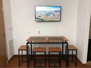 dinner table/ smart tv