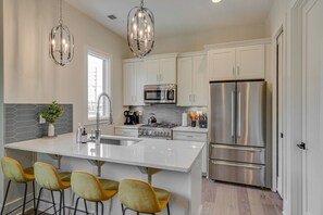 Create gourmet meals or enjoy delicious leftovers in our fully stocked designer kitchen, perfect for inspiring your inner chef.
