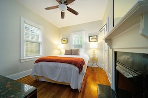 Master bedroom has a cable tv, fireplace, and ceiling fan for your comfort. 