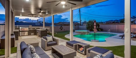 Large shade patio in the backyard Oasis.