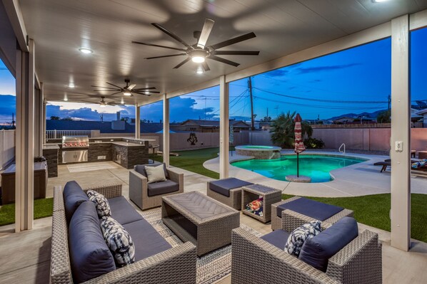 Large shade patio in the backyard Oasis.