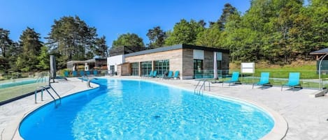 Lounge by the pool in the sunshine.