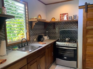 Full kitchen with gas stove, microwave, blender, toaster, coffee maker, etc...