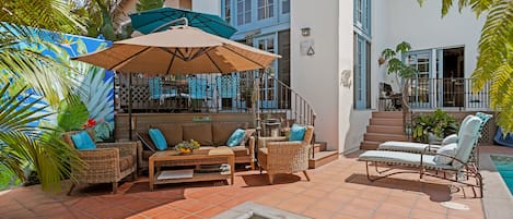 Private garden and patio with pool and hot tub