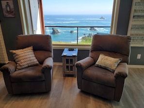 Recliners spin! Enjoy your morning coffee or tea while watching the ocean!