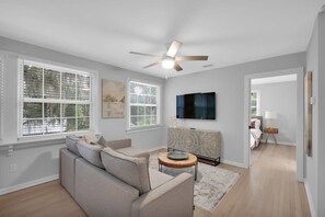 Airy living space with lots of natural lighting.