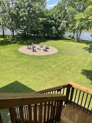 Stairs from your private deck leading to your riverfront property and firepit