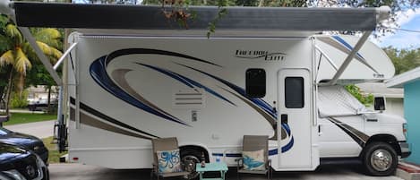 Like new 24' RV parked in our driveway in a nice, quiet neighborhood.