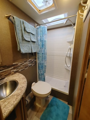 Larger than average size RV shower. 