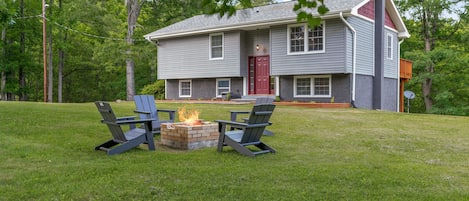 Large Yard with firepit perfect for entertaining.