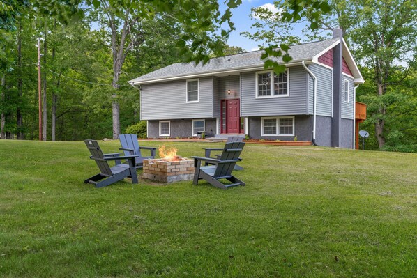 Large Yard with firepit perfect for entertaining.