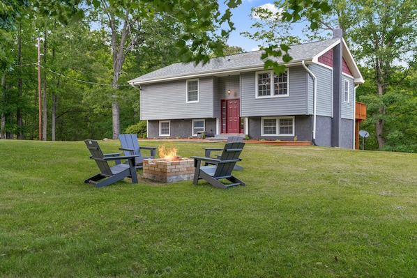 Large Yard with firepit perfect for entertaining.