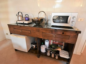 Cabinetry, Furniture, Countertop, Kitchen Appliance, Drawer, Wood, Kitchen Stove, Kitchen, Computer Desk, Chest Of Drawers