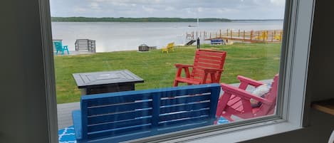 sit on the patio with a fire table or use the fire pit down by the water.