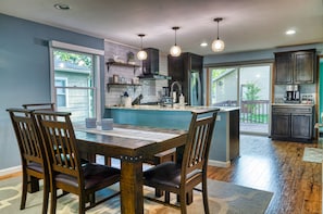 Dining area to enjoy meals together or to play games after a day on the lake!