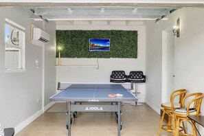 Game room w/ full size ping pong table, Smart TV and board games