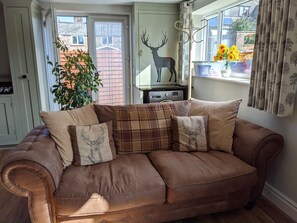The living space has a comfortable sofa.
