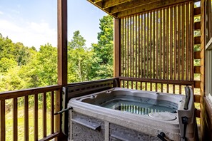 Lower deck hot tub over-looking the private lake 