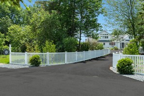 Entry driveway to Brooklin House on Herrick Bay, red mailbox on the right
