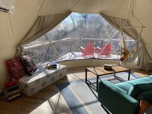 Bright sitting area with a nature view