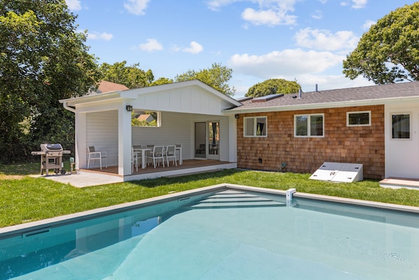 Large inground heated swimming pool. Shady covered porch for outdoor meals.